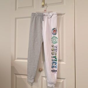 Brand new with tags. Girls size 12-14 Stranger Things Jogging Pant. Has 3 logos